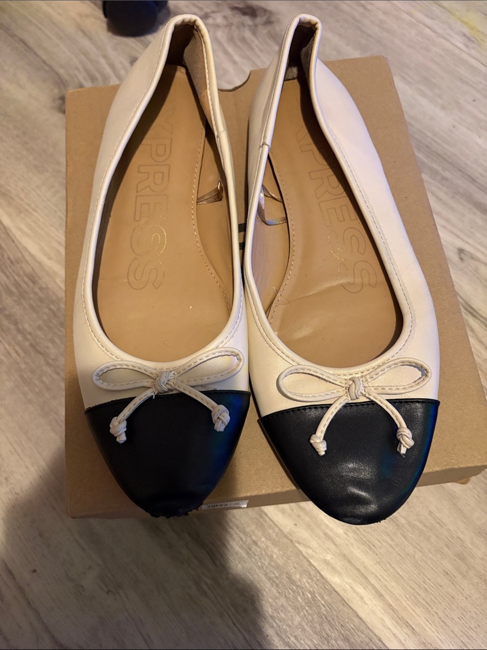 Express Two-Tone Cream and Black Bow Ballet Flats